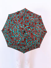 Load image into Gallery viewer, Block damaging UV sun rays and light rain with this stunning japarra umbrella. A 100% cotton parasol. Save your skin and protect your investment in skincare by blocking the sun's damaging UV rays, carry this lightweight japarra umbrella everywhere.
