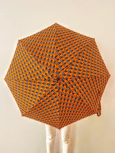 Load image into Gallery viewer, lightweight, portable japarra sun umbrella parasol in african print to protect you from the sun's damaging UV rays that cause burning, premature aging and skin cancer