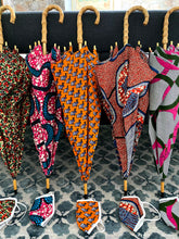 Load image into Gallery viewer, lightweight, portable sun umbrellas and parasols to protect you from the sun's damaging UV rays that cause burning, premature aging and skin cancer. All with matching face masks.