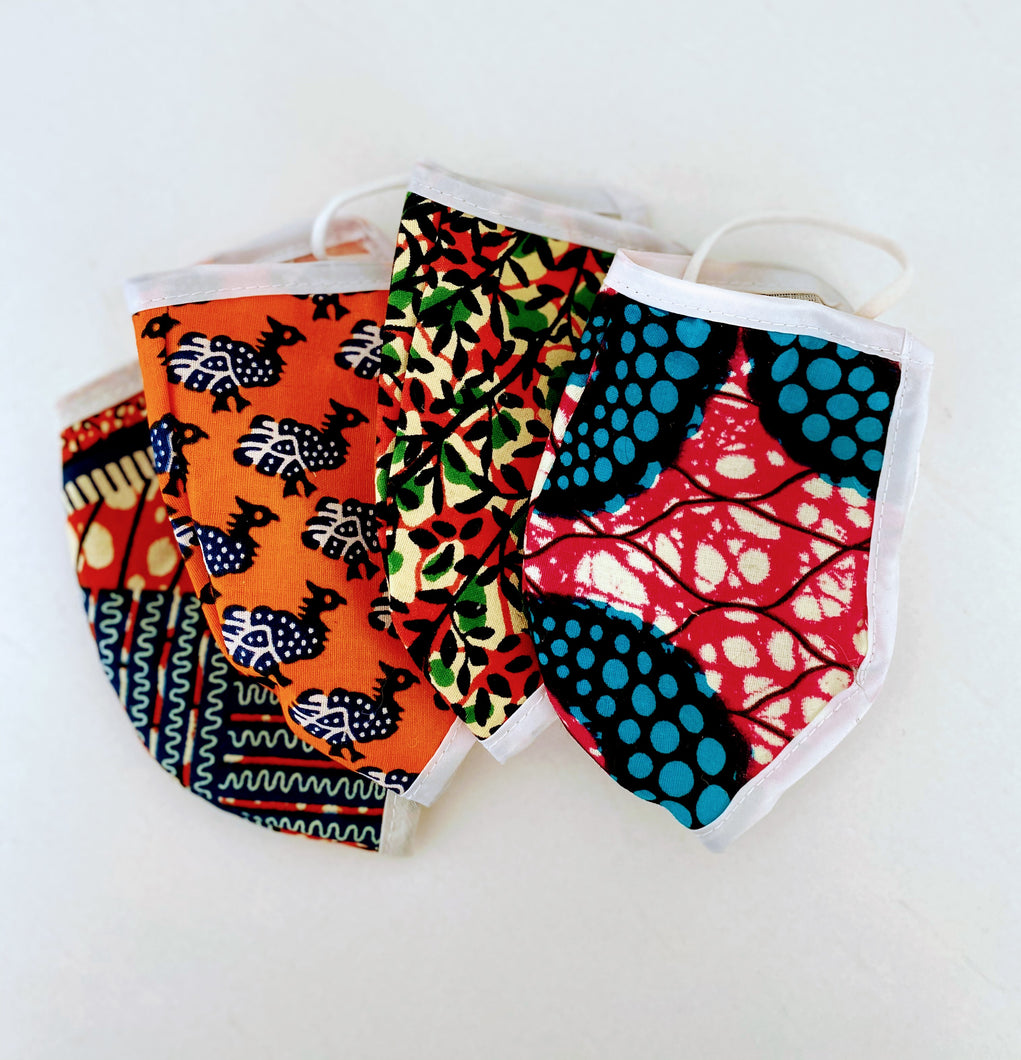 non medical grade 100% cotton face masks in bright prints. Double layer, comfortable fit, hand or machineswashable.