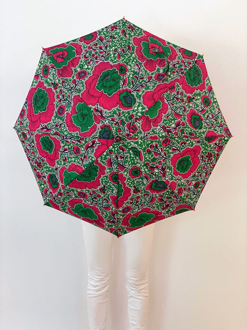A lightweight, portable japarra sun umbrella parasol to help her to block the sun's damaging UV rays that cause burning, premature aging and skin cancer.